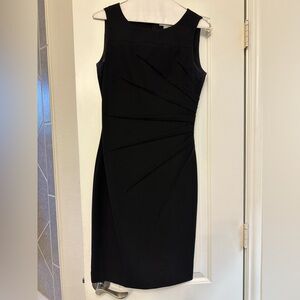 Calvin Klein sleeveless black dress with ruched side detail. Size 4.